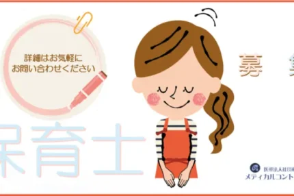 エプロンをつけてお辞儀する女性